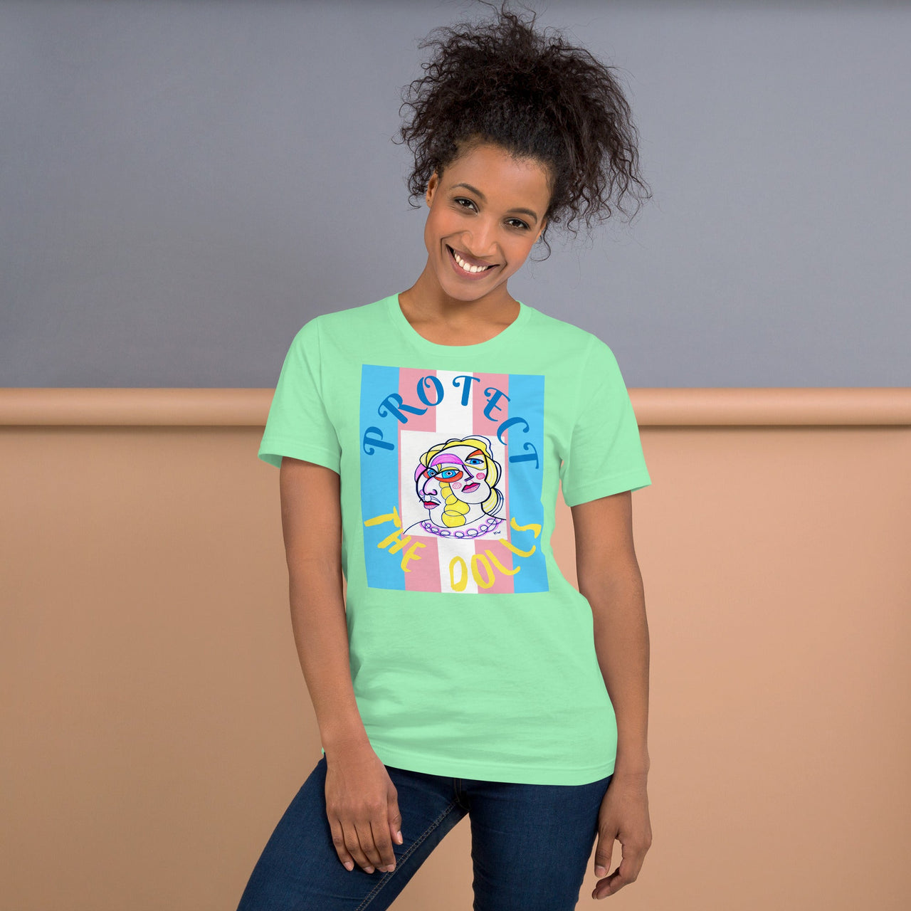 KW Gallery Wearable Art Tee 🏳️‍🌈 “Protect the Dolls” Pride Edition Tee C - Winter Sunshine Marketplace